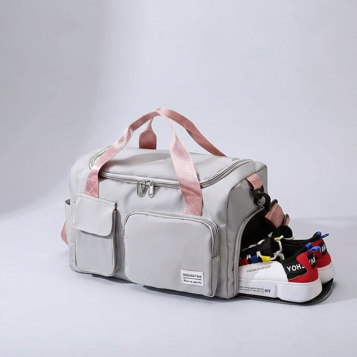 Ruime waterbestendige Travellea reistas open, ideaal voor vakantiebagage of gymkleding.