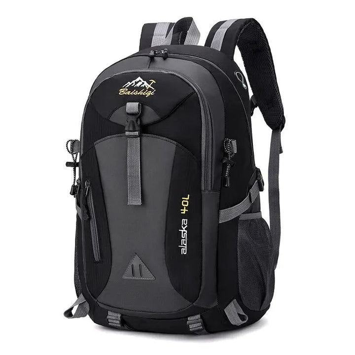 Blauwe unisex waterdichte rugzak van duurzaam nylon. Perfect als outdoor backpack voor reizen, wandelen en dagelijks gebruik.