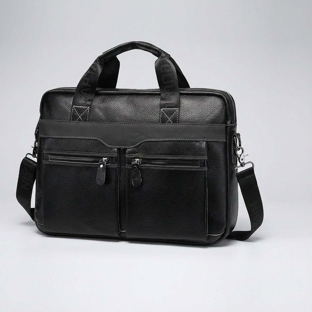Bruine UrbanSling leren laptoptas. Een ruime, unisex schoudertas voor werk en kantoor. Stijlvol en praktisch.