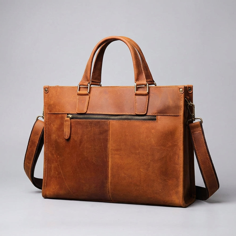 Professionele, duurzame leren laptoptas met georganiseerde vakken. Unisex aktetas voor 16-inch laptop en documenten.