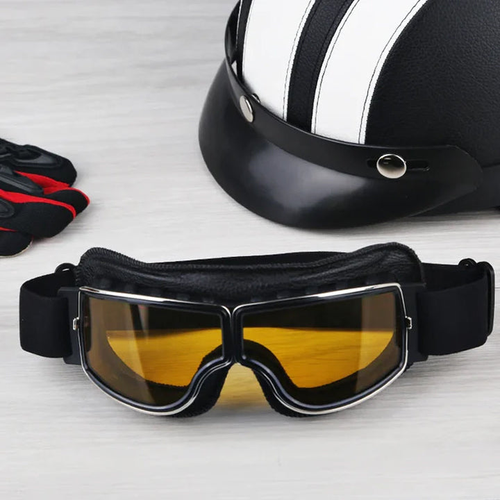 "Vintage-Motorradbrille mit UV-Schutz, klassisches Design aus Lederoptik, kratzfeste Linse, für Outdoor-Aktivitäten."