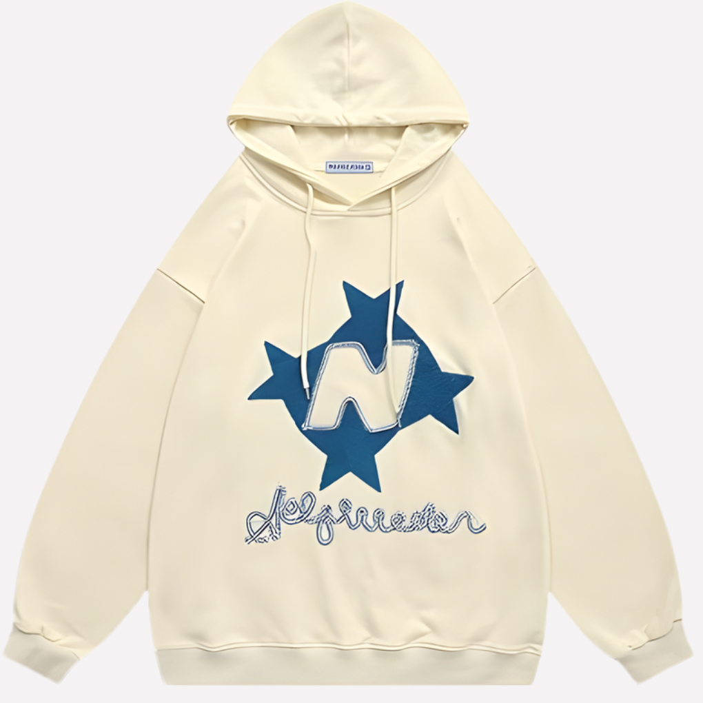 Close-up van de zachte stof en gedetailleerde sterprint van deze trendy oversized dames hoodie.