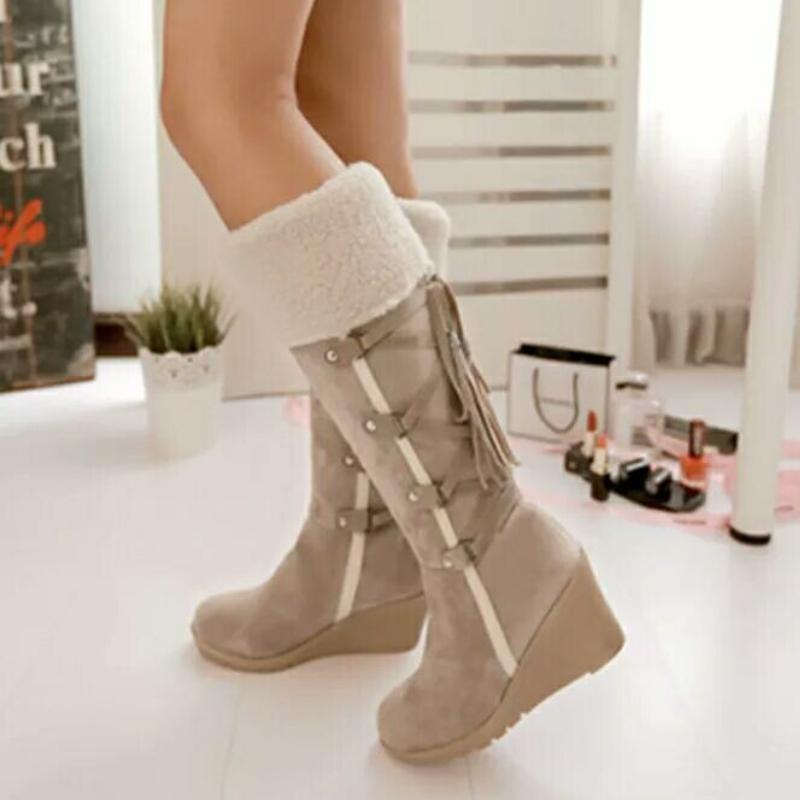 Warme dames winterlaarzen met sleehak, perfect voor stijlvolle wintermode en comfort.