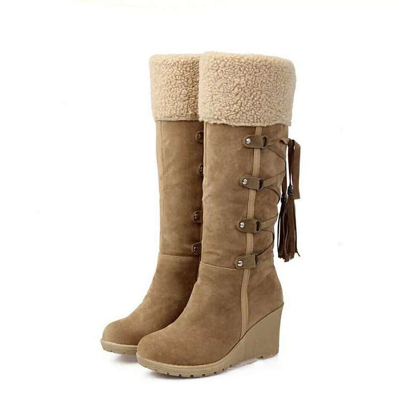 Dames winterboots met elegante sleehak, ideaal voor casual en chique winteroutfits.