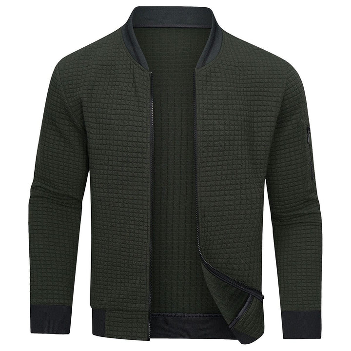 Grijze herenpullover met rits, close-up van de textuur en de comfortabele pasvorm.