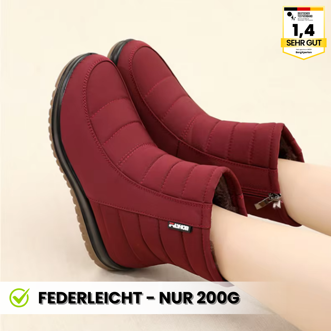 Waterdichte bruine dameslaarzen met antislipzool voor herfst en winter, geïsoleerd tegen kou.