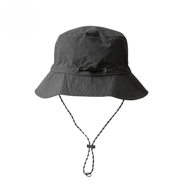Waterdichte, opvouwbare bucket hat, UPF 50+, brede rand, ideaal voor buitenactiviteiten, effen design.