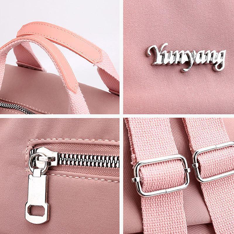 Waterdichte rugzak met USB-oplaadfunctie, grote capaciteit, zwart, voorkant; ideaal voor reizen en dagelijks gebruik.