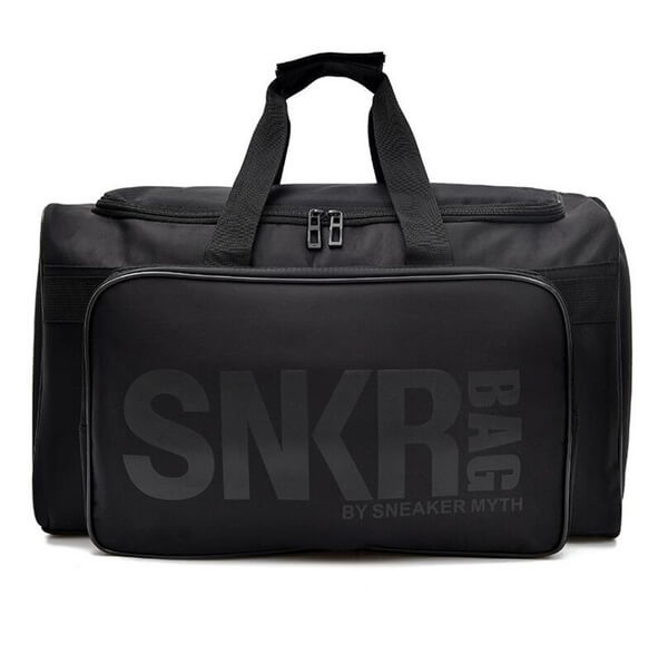 Ruime sneakertas, waterbestendig, met aparte vakken voor schoenen en sportgear, perfect voor onderweg.