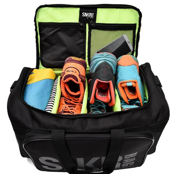 Unisex reistas, waterdicht, met diverse compartimenten voor sneakers, sportgear en reisbenodigdheden.