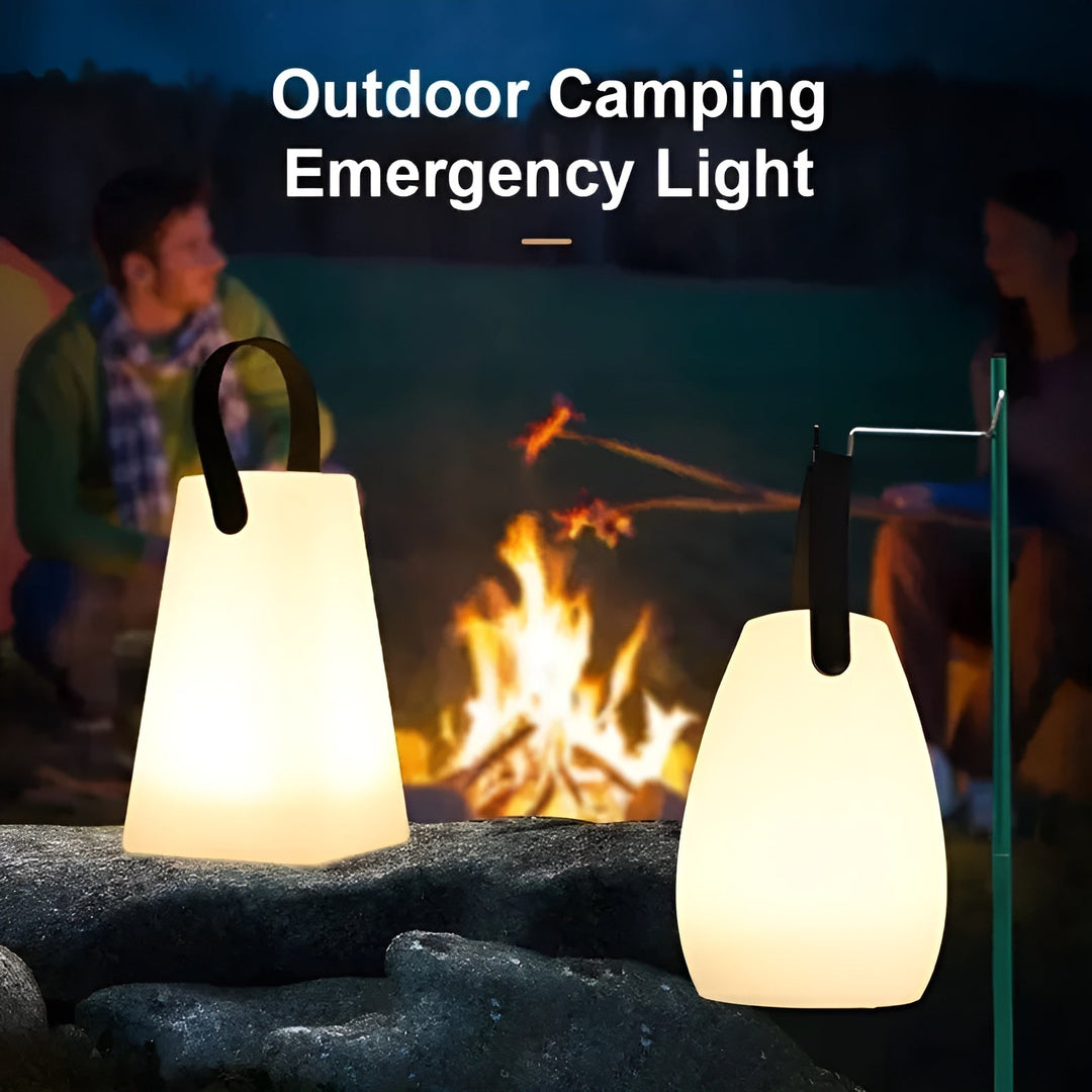Compacte draadloze Lumora LED tafellamp, waterdicht, oplaadbaar, ideaal voor camping of balkon.