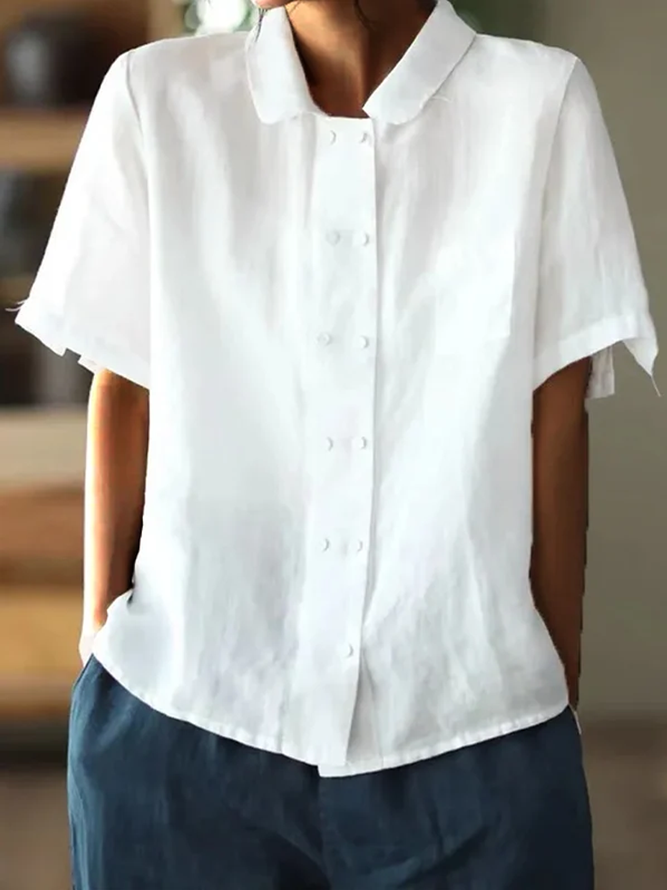 Witte casual damesblouse van katoen, korte mouwen, luchtig en perfect voor de zomer.