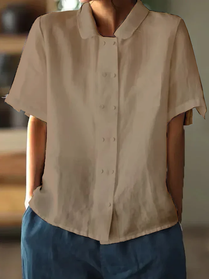 Witte casual damesblouse van katoen, korte mouwen, luchtig en perfect voor de zomer.