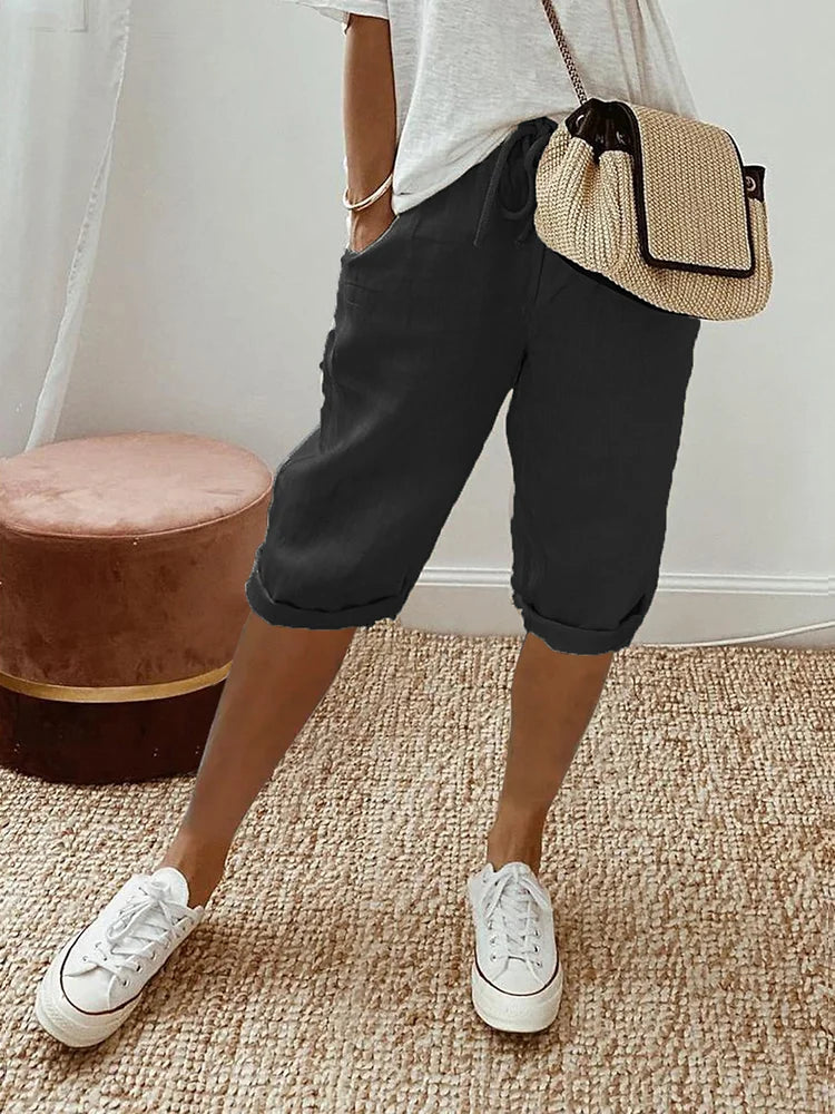 Witte lichte katoenen shorts voor dames, zomers, luchtig en comfortabel, ideaal voor warme dagen en stijlvolle looks.