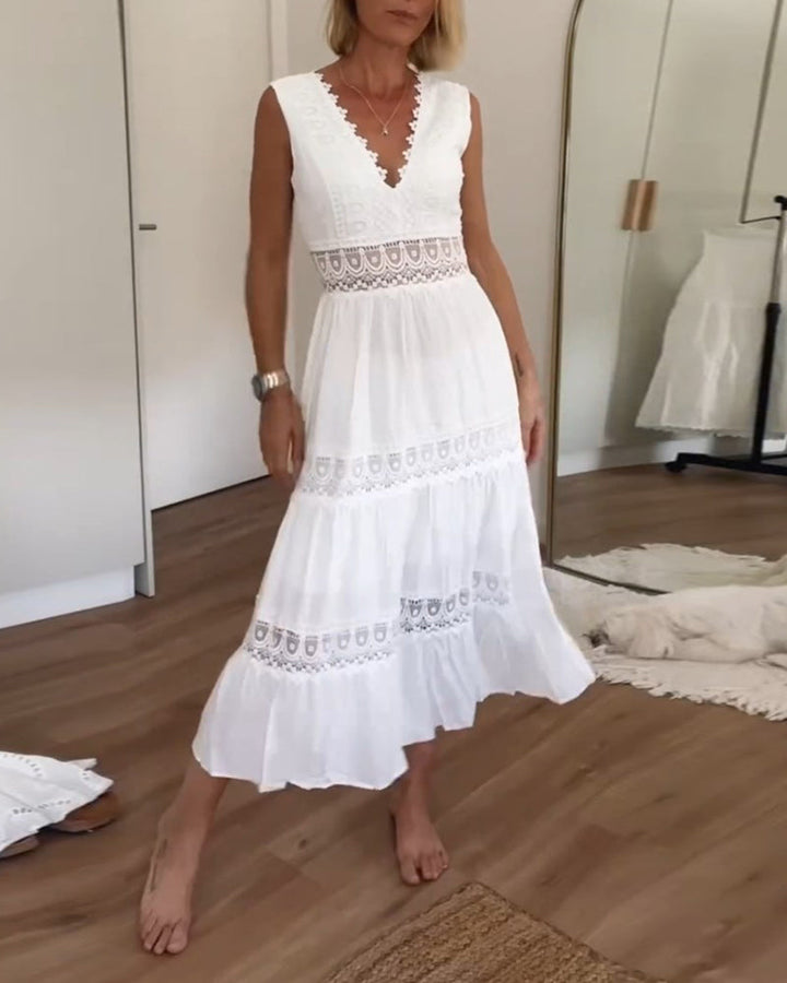 Witte Midi-Kanten Jurk voor Dames, mouwloos, met fijne kanten accenten en open rugontwerp, elegant en stijlvol.