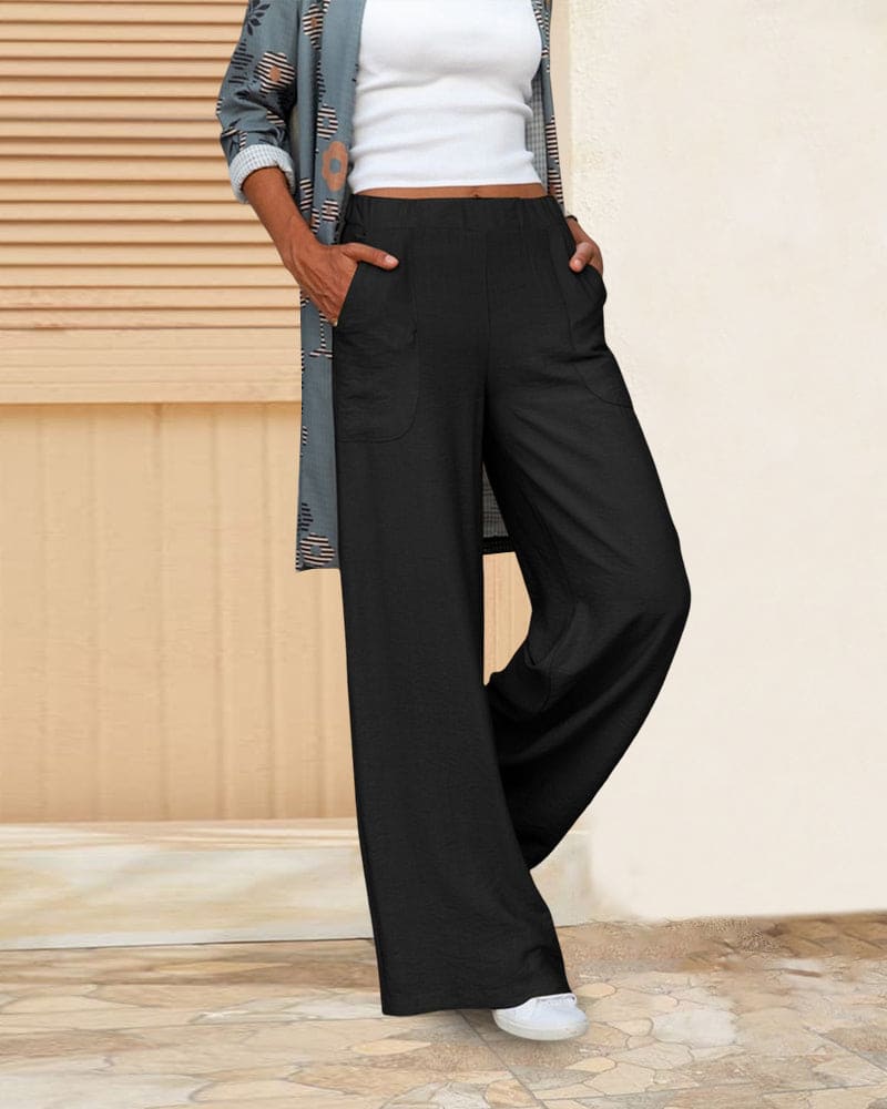 Dames wijde broek met elastische tailleband en zakken, ideaal voor comfort en stijl, zachte stof, casual pasvorm.