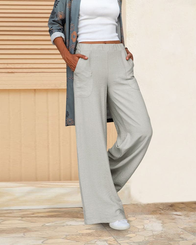 Dames wijde broek met elastische tailleband en zakken, ideaal voor comfort en stijl, zachte stof, casual pasvorm.