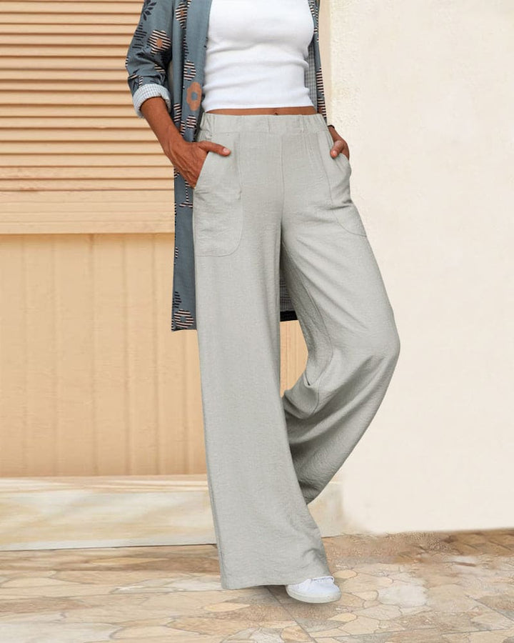 Dames wijde broek met elastische tailleband en zakken, ideaal voor comfort en stijl, zachte stof, casual pasvorm.
