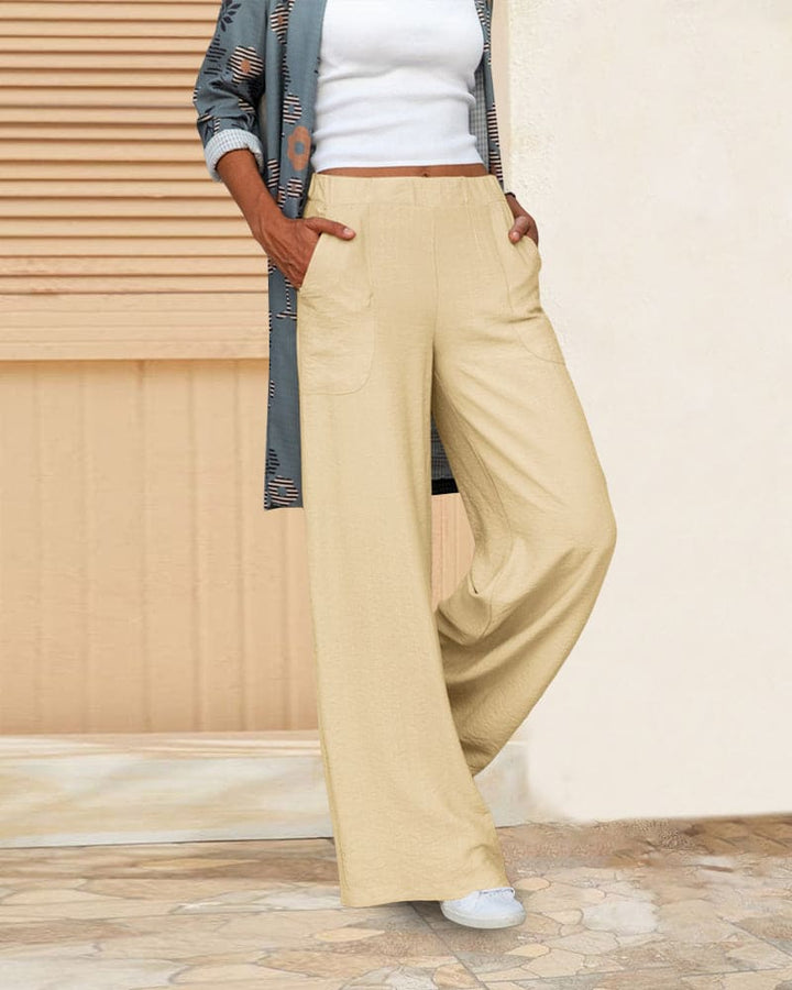 Dames wijde broek met elastische tailleband en zakken, ideaal voor comfort en stijl, zachte stof, casual pasvorm.