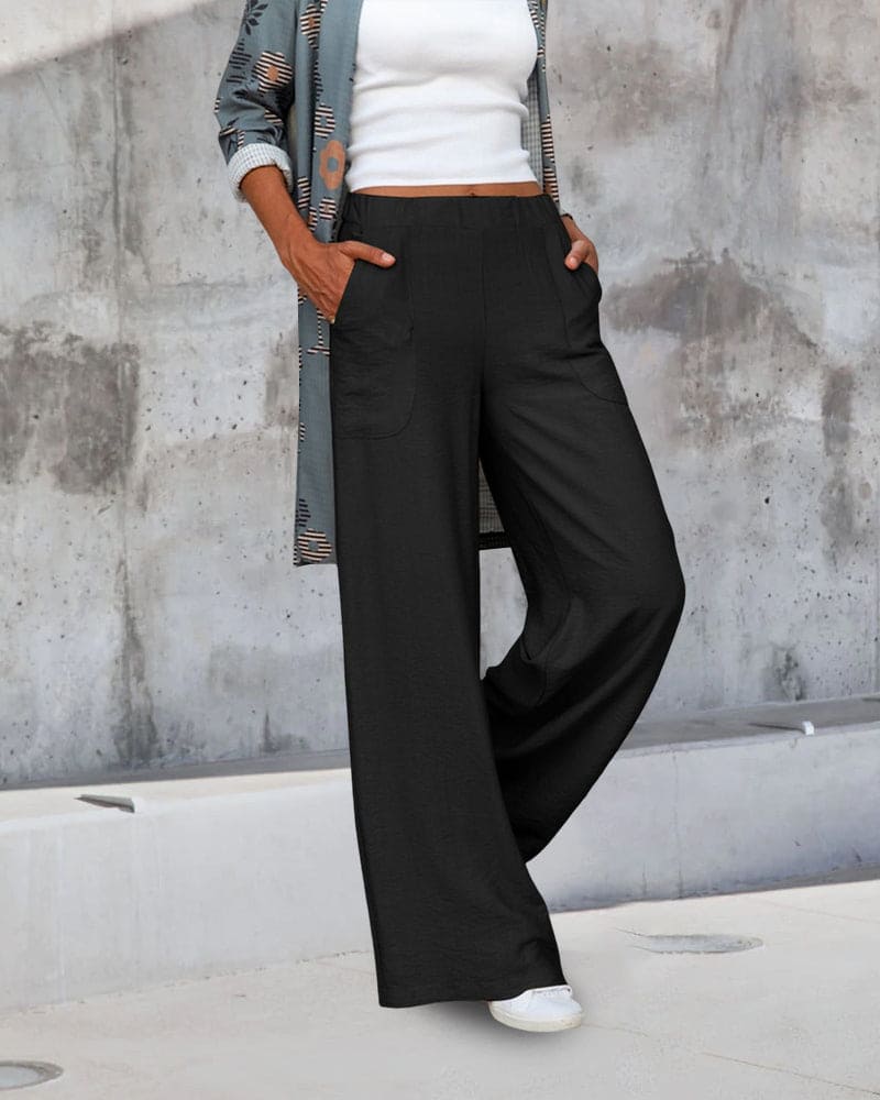 Dames wijde broek met elastische tailleband en zakken, ideaal voor comfort en stijl, zachte stof, casual pasvorm.