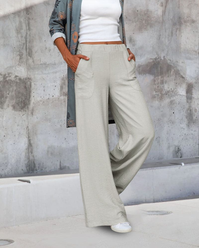 Dames wijde broek met elastische tailleband en zakken, ideaal voor comfort en stijl, zachte stof, casual pasvorm.
