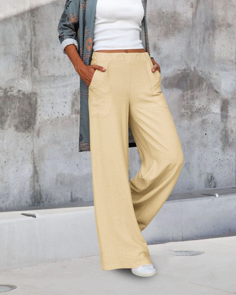 Dames wijde broek met elastische tailleband en zakken, ideaal voor comfort en stijl, zachte stof, casual pasvorm.