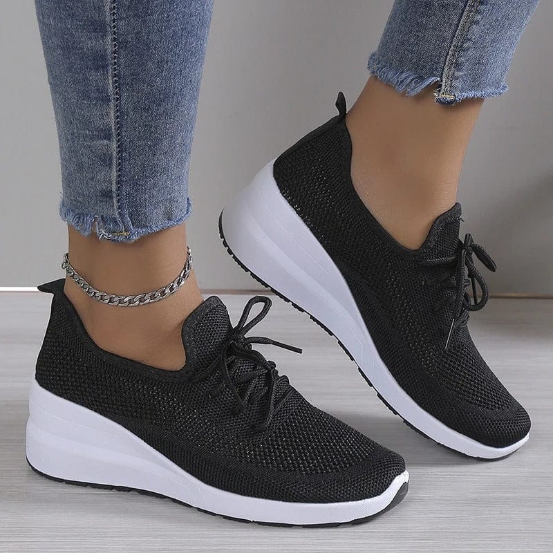 Zwarte orthopedische dames dagelijkse schoenen met geavanceerde voetboogsteun voor comfort.
