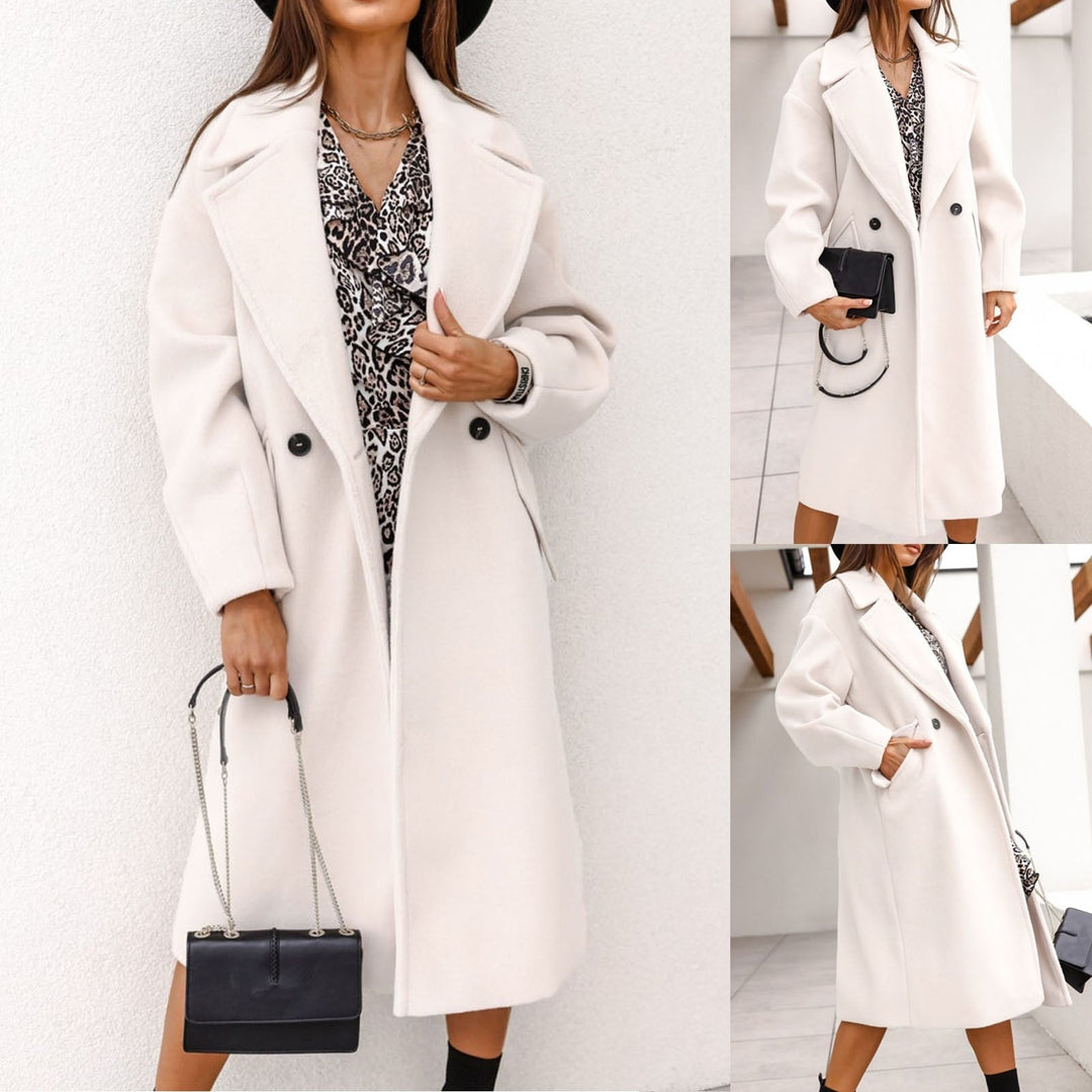 Witte JulesJacket lange dames winterjas, stijlvol en warm voor koude winterdagen.