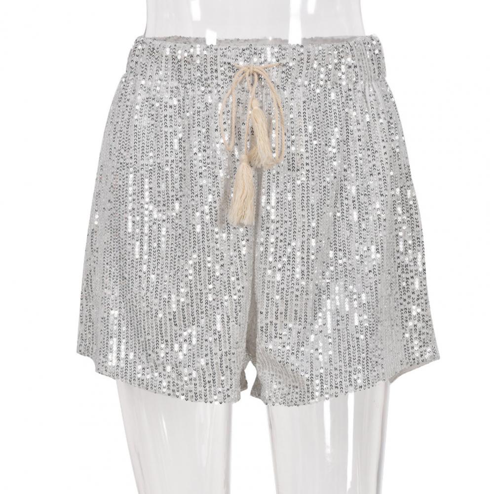 Trendy zilveren glitterbroek voor dames, geeft elke outfit een glamoureuze en comfortabele touch. Fashion.