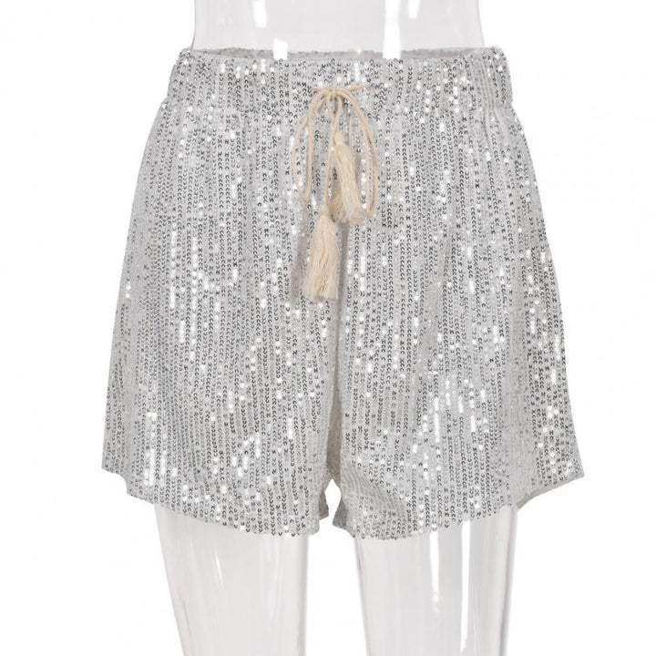 Trendy zilveren glitterbroek voor dames, geeft elke outfit een glamoureuze en comfortabele touch. Fashion.