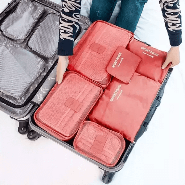 Zwarte 12-delige bagage inpak kubussen set voor georganiseerd reizen en ruimtebesparing.