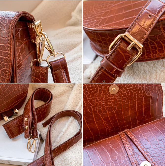 Elegante dames schoudertas met unieke krokodillenprint, perfect voor elke outfit. Zwarte Chelsey handtas.