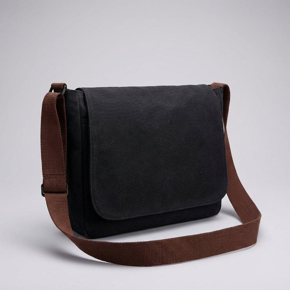 Klassieke zwarte canvas crossbody tas, unisex en duurzaam, ideaal voor laptop en organisatie van al je spullen.