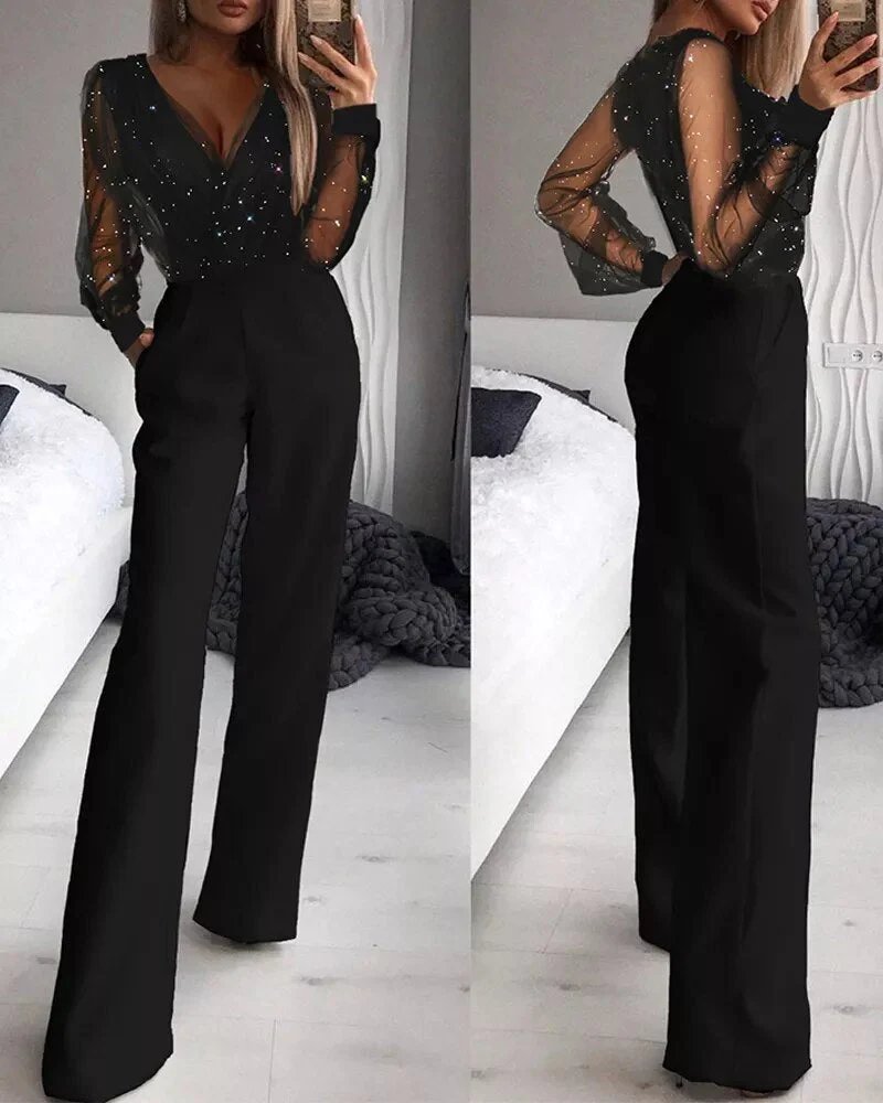 Zwarte glitter jumpsuit voor dames, ideaal voor feestelijke avonden. Elegant, comfortabel en stijlvol.