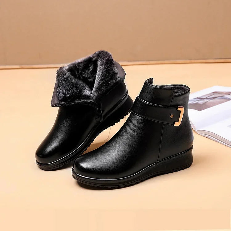 Zwarte orthopedische Ella leren dameslaarzen met warme voering voor wintercomfort en ondersteuning.