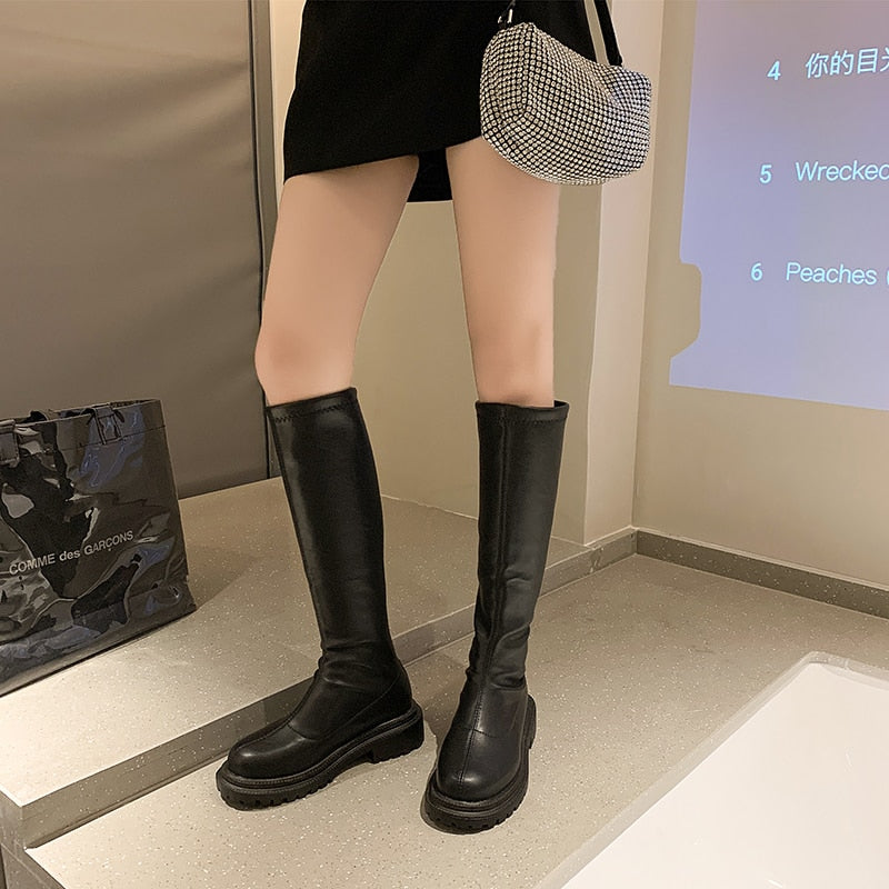 Bruine leren enkellaarzen voor dames. Stijlvolle SloaneBoots die comfort en mode perfect combineren, dagelijks te dragen.