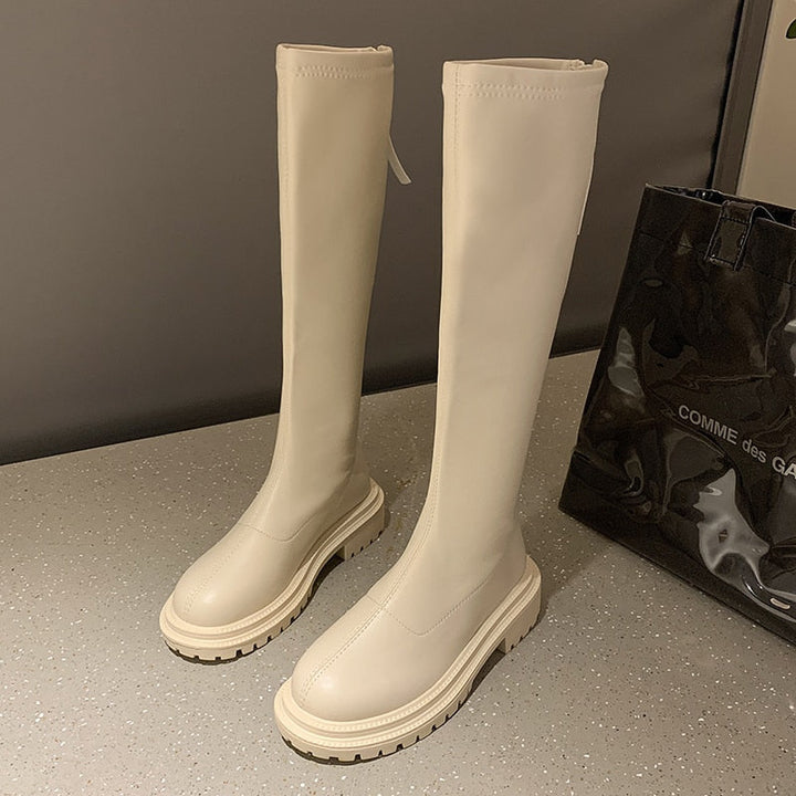 Witte SloaneBoots dames enkellaarzen. Deze stijlvolle en modieuze leren schoenen bieden comfort voor diverse outfits.