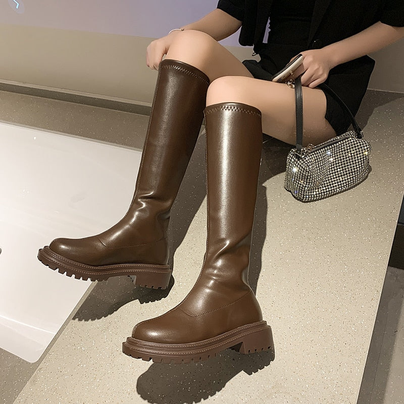 Elegante leren SloaneBoots dames enkellaarzen. Comfortabele en modieuze damesschoenen, ideaal voor een stijlvolle look.