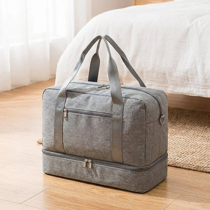 Zwarte Stowport unisex reistas met apart schoenenvak, ideaal voor georganiseerd reizen en sport.