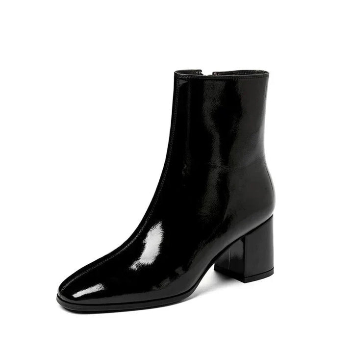 Trendy lakleren dameslaarzen 'Luna' in zwart/wit. Veelzijdig en comfortabel voor een complete winteroutfit.