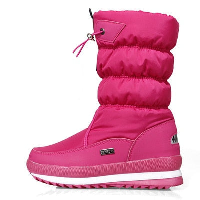 Stevige zwarte waterdichte dames snowboots met een duurzame zool en warme binnenvoering, klaar voor de winter.