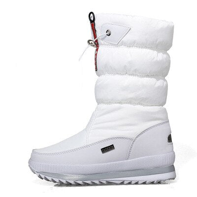 Paar zwarte waterdichte dames snowboots, comfortabel en warm, perfect voor sneeuw en winterse kou.